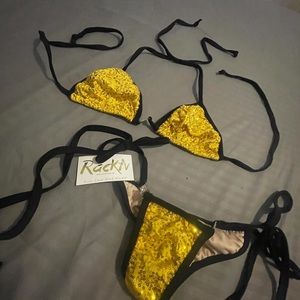 Two piece bathing suits . NEVWR WOEN BEAND NEW WITH TAGs. Scrunch bottom .